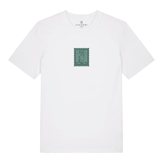 White t-shirt with a small green stamp logo on a white background